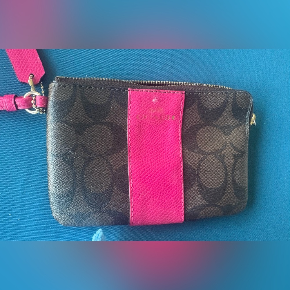 Coach wristlet in canvas logo with leather trimming EUC